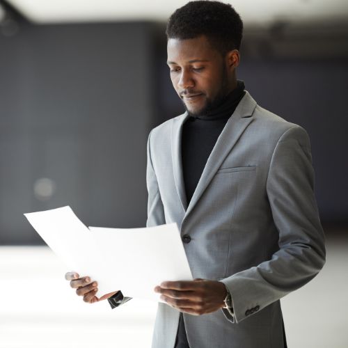 black business person looking at documents